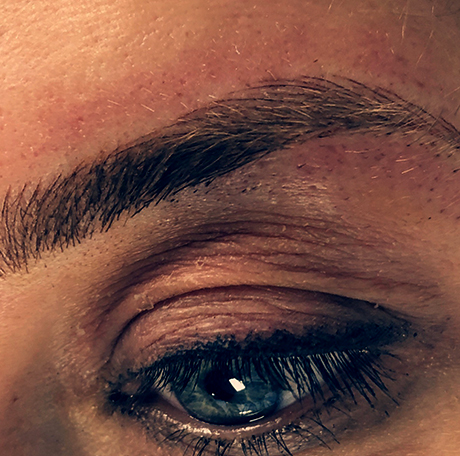 Brow detail — blue eye