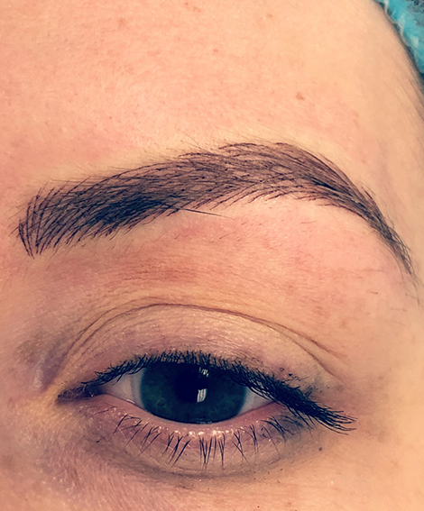 Finished microbladed brow with natural hair strokes